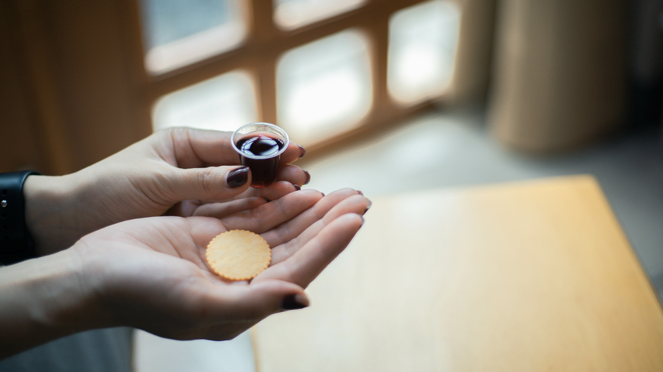 What did the early church believe about communion?