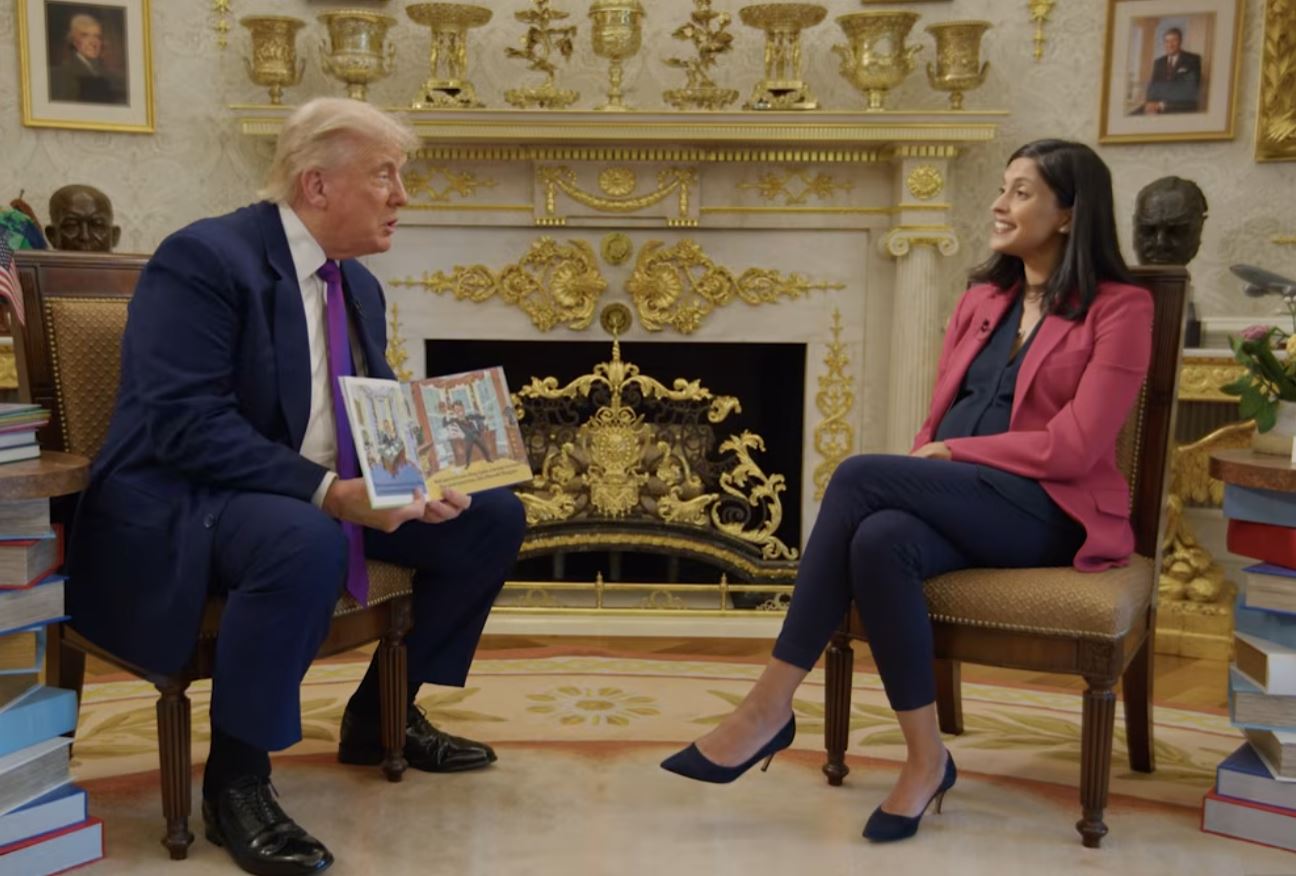 President Trump reads a book during fun sit-down with Second Lady Usha Vance